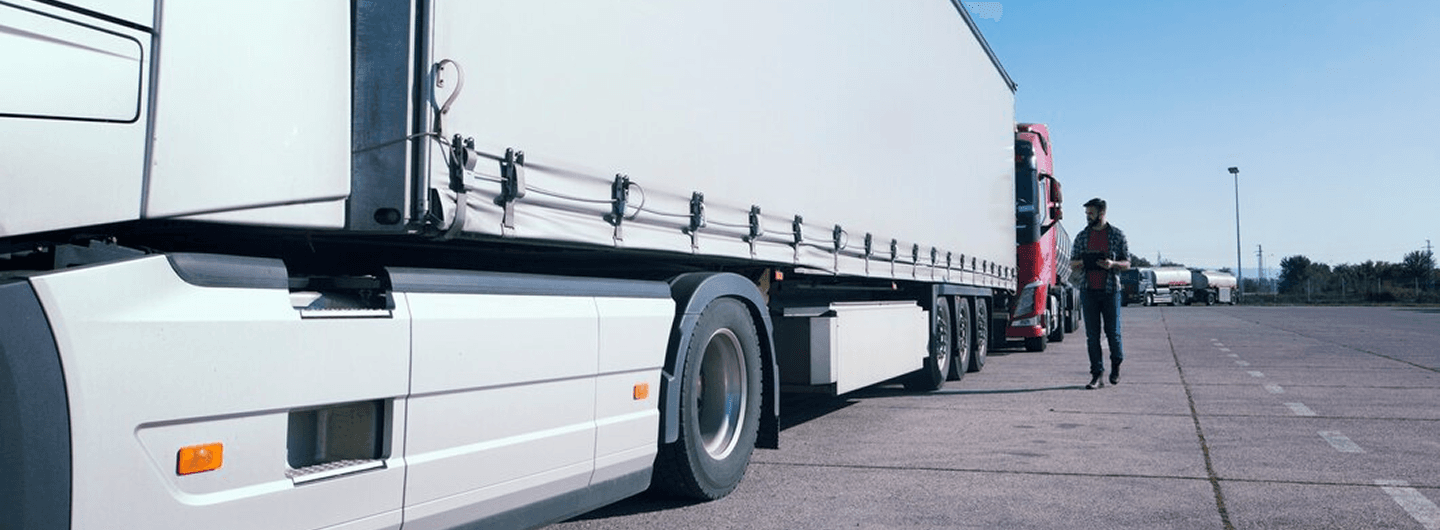 Semi-truck parked at a logistics depot